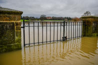 Floodwater surrounding Tewkesbury Abbey, where flood watches are in place with more wet weather expected in the coming days.