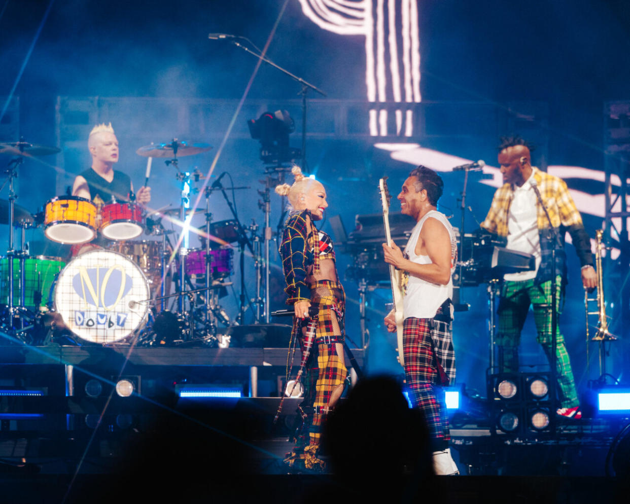 No Doubt’s Gwen Stefani and Tony Kanal exchange a smile at Coachella (photo: Ashley Osborn)