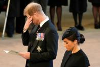 <p>Prince Harry wiped away tears as he paid his respects with wife Meghan, Duchess of Sussex at Westminster Hall where the coffin of Queen Elizabeth II lay in state ahead of her funeral. (Getty)</p> 