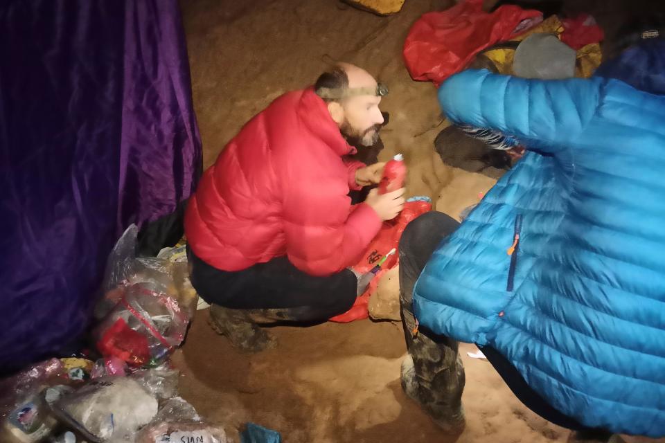 American caver Mark Dickey, left, 40, talks to a colleague inside the Morca cave near Anamur, southern Turkey, Thursday, Sept. 7, 2023. (AP)