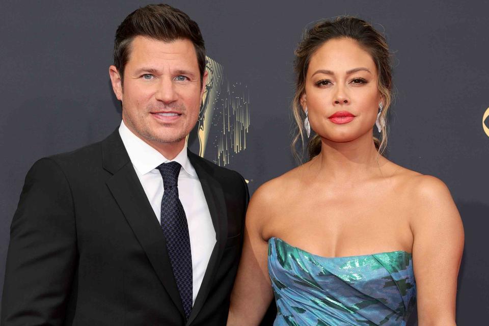 <p>Rich Fury/Getty </p> Nick and Vanessa Lachey attend the 73rd Primetime Emmy Awards in 2021