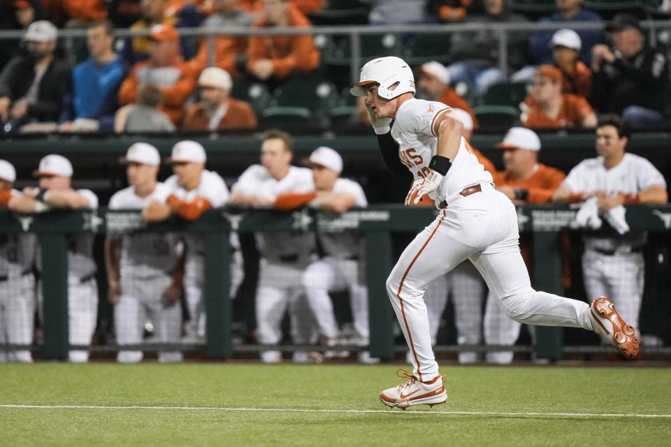 Texas catcher Kimble Schuessler (10) runs to first base as the Longhorns play San Diego at UFCU Disch–Falk Field on Friday, Feb. 16, 2024.