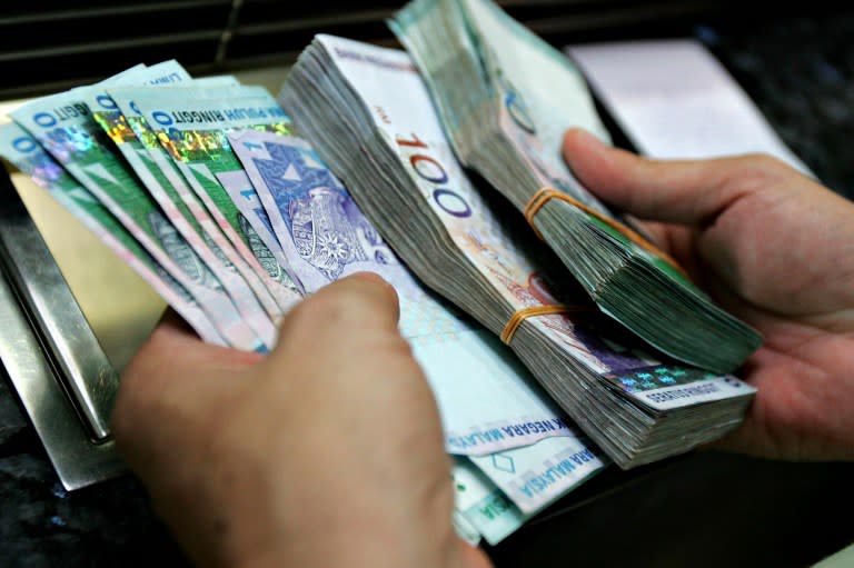 An ex-MCMC official was accused of misappropriating RM17,930 from a budget requisition memorandum to facilitate and organise an internet awareness programme in schools in Sabah. — AFP pic