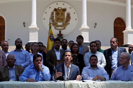Venezuelan opposition leader Juan Guaido, who many nations have recognized as the country's rightful interim ruler, talks to the media during a news conference in Caracas, Venezuela March 10, 2019. REUTERS/Ivan Alvarado