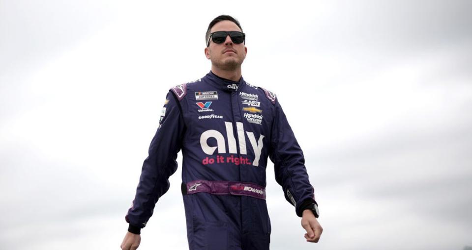 DOVER, DELAWARE - APRIL 27: Alex Bowman, driver of the #48 Ally Chevrolet, walks the grid during practice for the NASCAR Cup Series Würth 400 at Dover International Speedway on April 27, 2024 in Dover, Delaware. (Photo by James Gilbert/Getty Images)