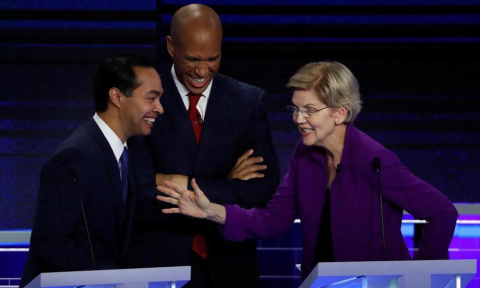 Candidates chat during a break at the first US 2020 presidential election Democratic candidates debate in Miami, Florida