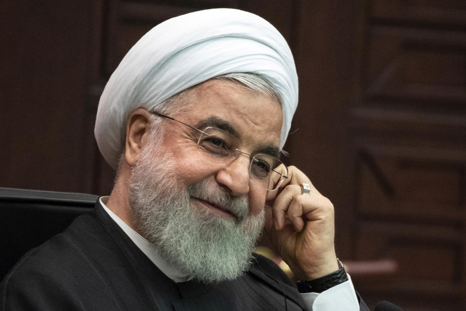 FILE - In this Sept. 16, 2019, file photo, Iranian President Hassan Rouhani attends a joint news conference in Ankara, Turkey. Rouhani reiterated Tuesday, Sept. 24, that he would not consider meeting with President Donald Trump unless sanctions imposed against his country since 2018 were first lifted. (AP Photo/Pavel Golovkin, Pool, File)