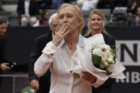Martina Navratilova, the 18-time Grand Slam singles champion and member of the International Tennis Hall of Fame, sends a kiss to the audience after receiving the Racchetta d'Oro (Golden Racket) award from the Italian Tennis Federation ahead of the men's final tennis match at the Italian Open tennis tournament in Rome, Italy, Sunday, May 21, 2023. (AP Photo/Alessandra Tarantino)