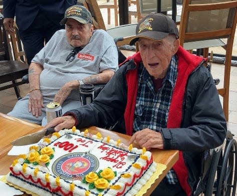 Joe DeMarco, of Philadelphia, cuts the cake at his 100th birthday celebration in the Beer Garden at Parx Casino in Bensalem on Friday Aug. 9, 2024.