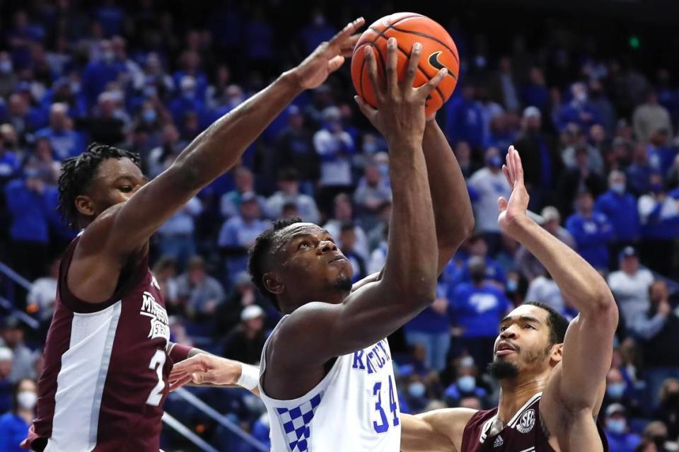 Oscar Tshiebwe grabs the ball in Kentucky’s game against Mississippi State on Tuesday, Jan. 25, 2022, at Rupp Arena in Lexington, Ky.