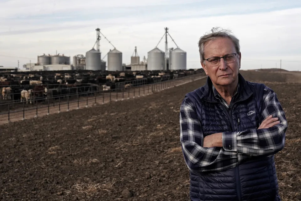 Lee Reeve poses for a photo at the cattle feedyard and ethanol plant operated by his family Thursday, Jan. 5, 2023, near Garden City, Kan. Reeve sees language by the Kansas Water Authority on controlling groundwater use in western Kansas as "toxic,"as the Kansas Legislature looks to take up ways to address depletion of the Ogallala Aquifer in the upcoming session. (AP Photo/Charlie Riedel)