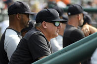 Detroit Tigers manager A.J. Hinch, front, watches his team play against the Chicago White Sox in the first inning of a baseball game, Sunday, Sept. 18, 2022, in Detroit. (AP Photo/Jose Juarez)