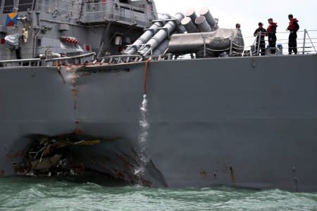 The U.S. Navy guided-missile destroyer USS John S. McCain is seen after a collision, in Singapore waters August 21, 2017. REUTERS/Ahmad Masood