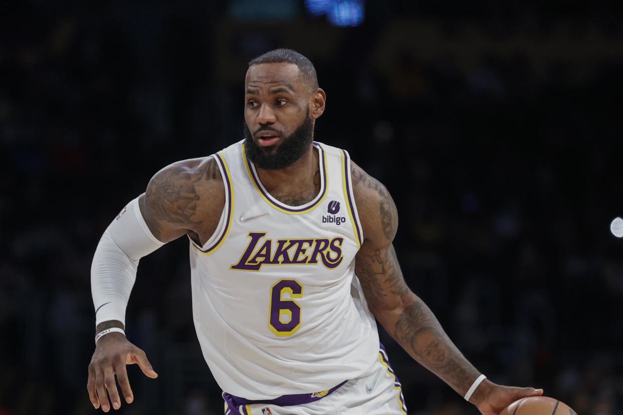 Los Angeles Lakers forward LeBron James (6) drives against the Minnesota Timberwolves during the first half of an NBA basketball game in Los Angeles, Sunday, Jan. 2, 2022. (AP Photo/Ringo H.W. Chiu)