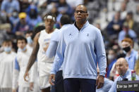 North Carolina head coach Hubert Davis watches play in the second half of an NCAA college basketball game against Purdue, Saturday, Nov. 20, 2021, in Uncasville, Conn. (AP Photo/Jessica Hill)