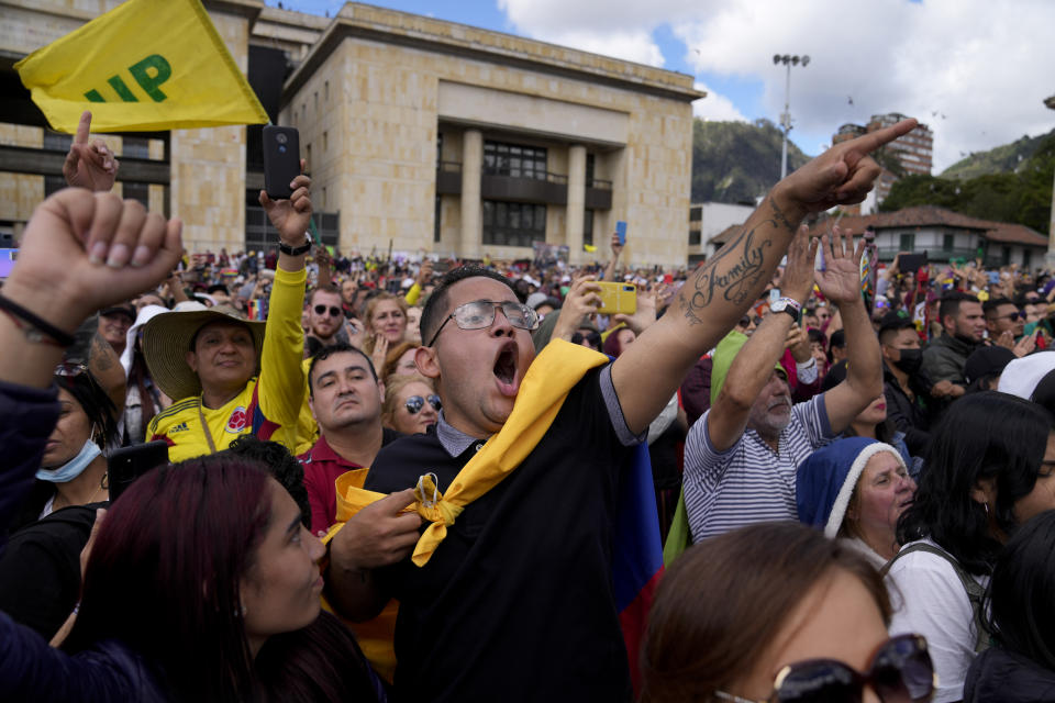 Supporters of President Gustavo Petro during his inauguration ceremony at the Bolivar square in Bogota, Colombia, Sunday, Aug. 7, 2022. (AP Photo/Ariana Cubillos)