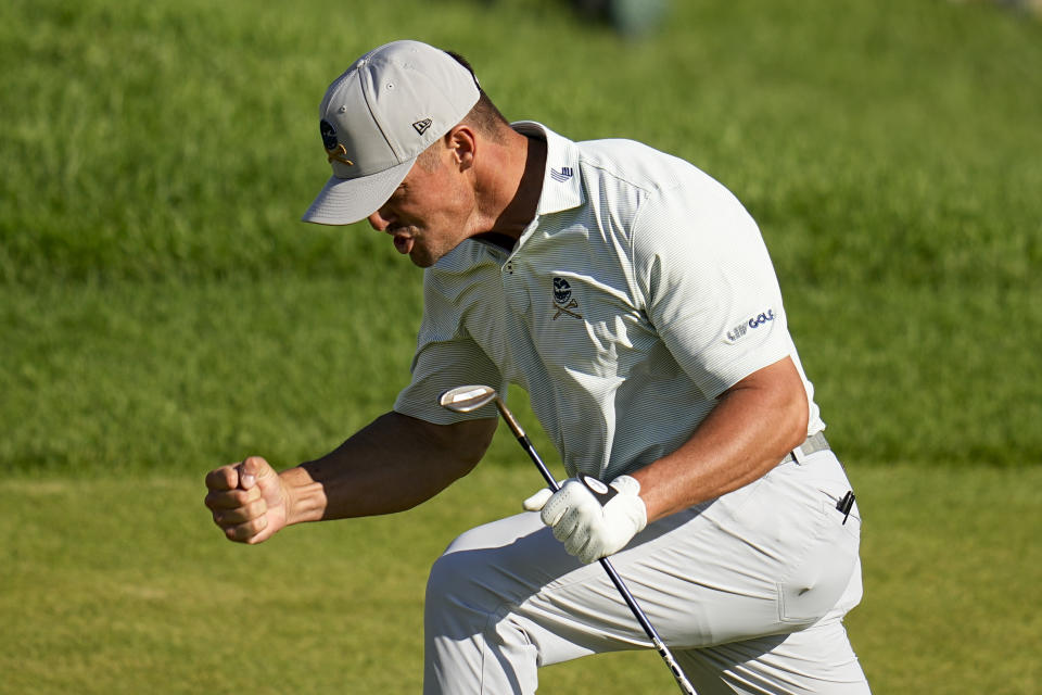 Bryson DeChambeau celebrates after a eagle on the 18th hole during the third round of the PGA Championship golf tournament at the Valhalla Golf Club, Saturday, May 18, 2024, in Louisville, Ky. (AP Photo/Sue Ogrocki)