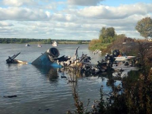 A photo provided by Russia's Emergency Ministry shows the wreckage of a Yak-42 passenger jet that crashed on takeoff near Yaroslavl's city airport, killing at least 43 people