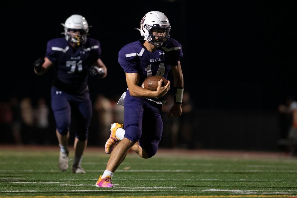 Upper Moreland senior Shawn Herbert carries the ball at Upper Moreland High School on Friday, August 26, 2022. The Bears defeated the Hatters 41-0 in the opening game of the season.