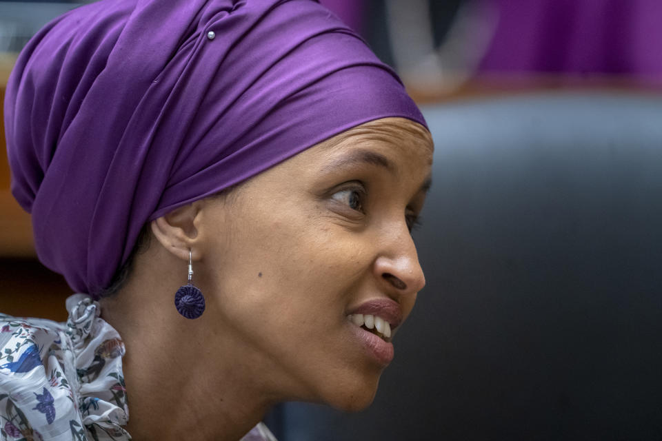 Rep. Ilhan Omar, D-Minn., sits with fellow Democrats on the House Education and Labor Committee during a bill markup, on Capitol Hill in Washington, Wednesday, March 6, 2019. Omar stirred controversy last week saying that Israel's supporters are pushing U.S. lawmakers to take a pledge of "allegiance to a foreign country." Omar is not apologizing for that remark, and progressives are supporting her. (AP Photo/J. Scott Applewhite)