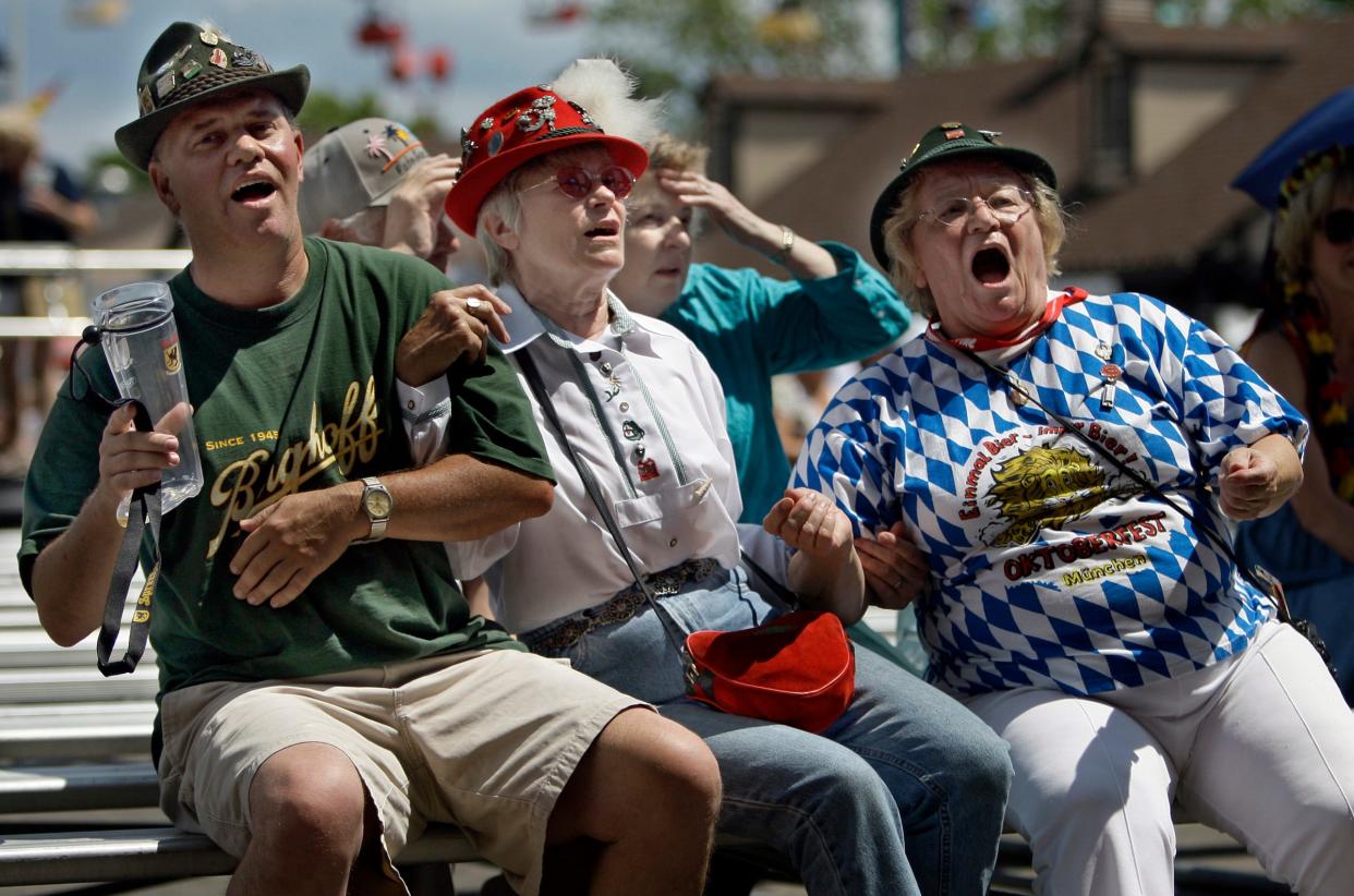 Richard Noeller, Paula Malloy and Edith Saurer enjoy music during German Fest in 2009.