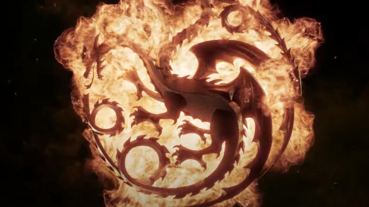  The Targaryen crest drenched in fire, the House of the Dragon logo. 