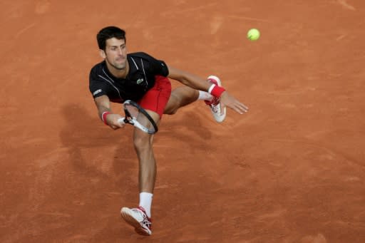 Road back to the top: Novak Djokovic reached his 12th French Open quarter-final with his 200th clay-court win