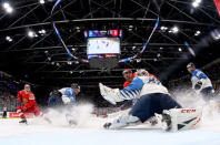 Ice Hockey World Championships - Semifinals - Russia v Finland - Ondrej Nepela Arena, Bratislava, Slovakia - May 25, 2019 Finland's Kevin Lankinen and Russia's Evgeni Malkin in action. Andre Ringuette/Pool via REUTERS