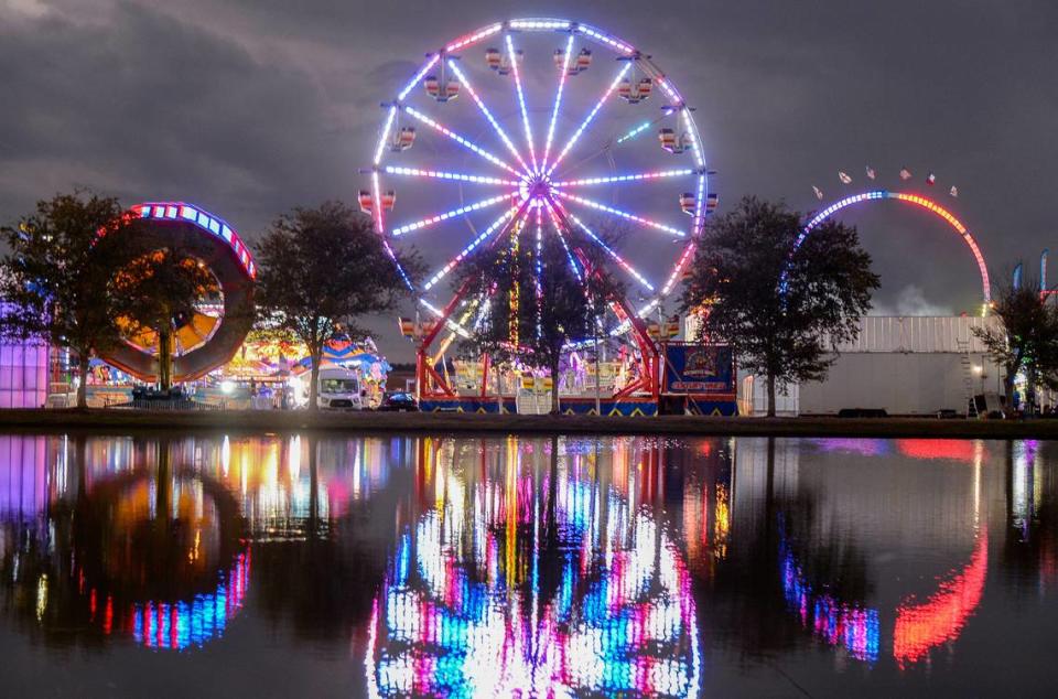 The Midway lights up the Georgia National Fairgrounds in Perry.