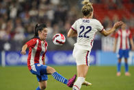 Paraguay midfielder Fanny Godoy (10) works against U.S. midfielder Kristie Mewis (22) during the first half of an international friendly soccer match Thursday, Sept. 16, 2021, in Cleveland. (AP Photo/Tony Dejak)