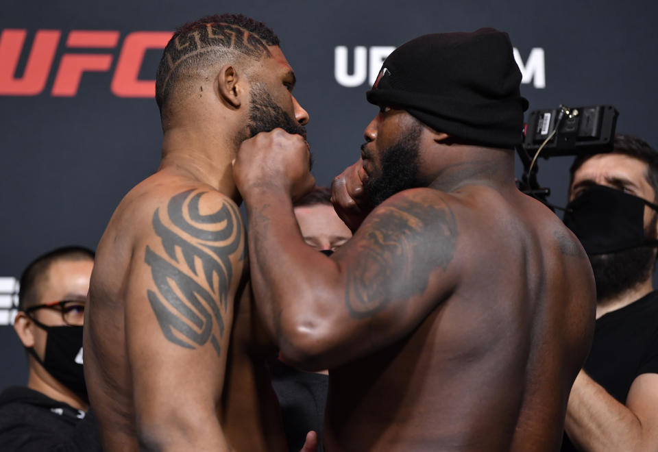 LAS VEGAS, NEVADA - FEBRUARY 19: (L-R) Opponents Curtis Blaydes and Derrick Lewis face off during the UFC weigh-in at UFC APEX on February 19, 2021 in Las Vegas, Nevada. (Photo by Chris Unger/Zuffa LLC)