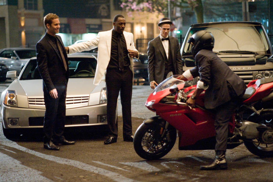 TAKERS, standing from left: Paul Walker, Idris Elba, Hayden Christensen, 2010. ph:Suzanne Tenner/©Screen Gems/courtesy Everett Collection