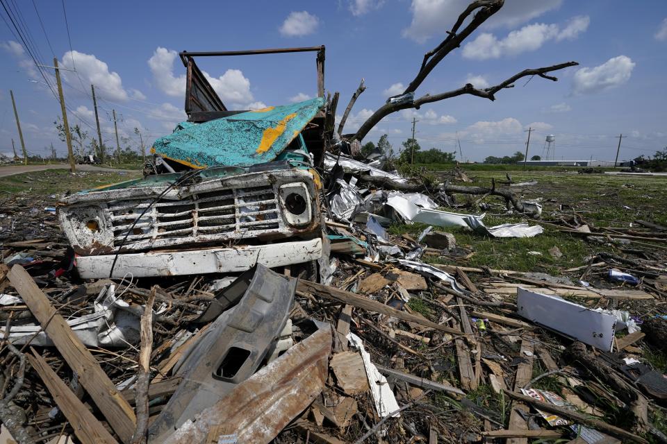 Destruction from the deadly tornado is piled up in Rolling Fork, Miss., Tuesday, May 9, 2023. While the dangers of tornadoes to mobile homes have long been known, and there are ways to mitigate the risk, the percentage of total tornado deaths that happen in mobile homes has been increasing. (AP Photo/Gerald Herbert)