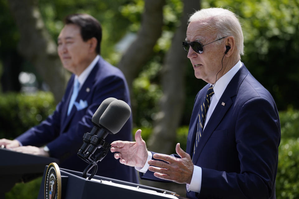 South Korea's President Yoon Suk Yeol listens as President Joe Biden speaks during a news conference in the Rose Garden of the White House on Wednesday, April 26, 2023, in Washington. (AP Photo/Evan Vucci)