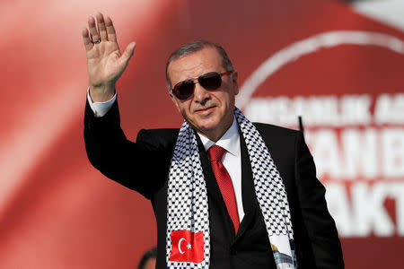 Turkish President Tayyip Erdogan greets the crowd as he takes part in a protest against the recent killings of Palestinian protesters on the Gaza-Israel border and the U.S. embassy move to Jerusalem, in Istanbul, Turkey May 18, 2018. REUTERS/Murad Sezer