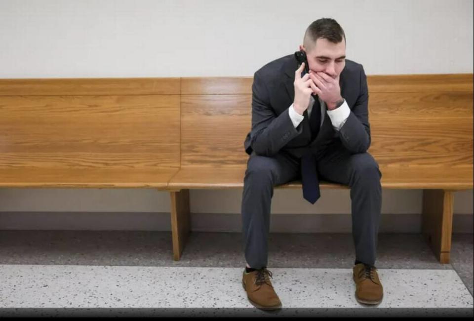 Jacob Reichert awaits another court appearance at Benton County District Court in Kennewick on Feb 7. The county has a shortage of public defenders, so many people have to make repeated court appearances.