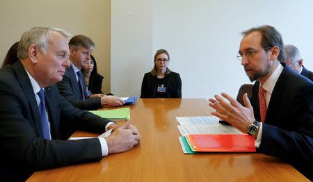 United Nations High Commissioner for Human Rights Zeid Ra'ad Al Hussein (R) talks with French Foreign Minister Jean-Marc Ayrault during a bilateral meeting aside of the 31st Session of the Human Rights Council at the U.N. European headquarters in Geneva, Switzerland, February 29, 2016. REUTERS/Denis Balibouse