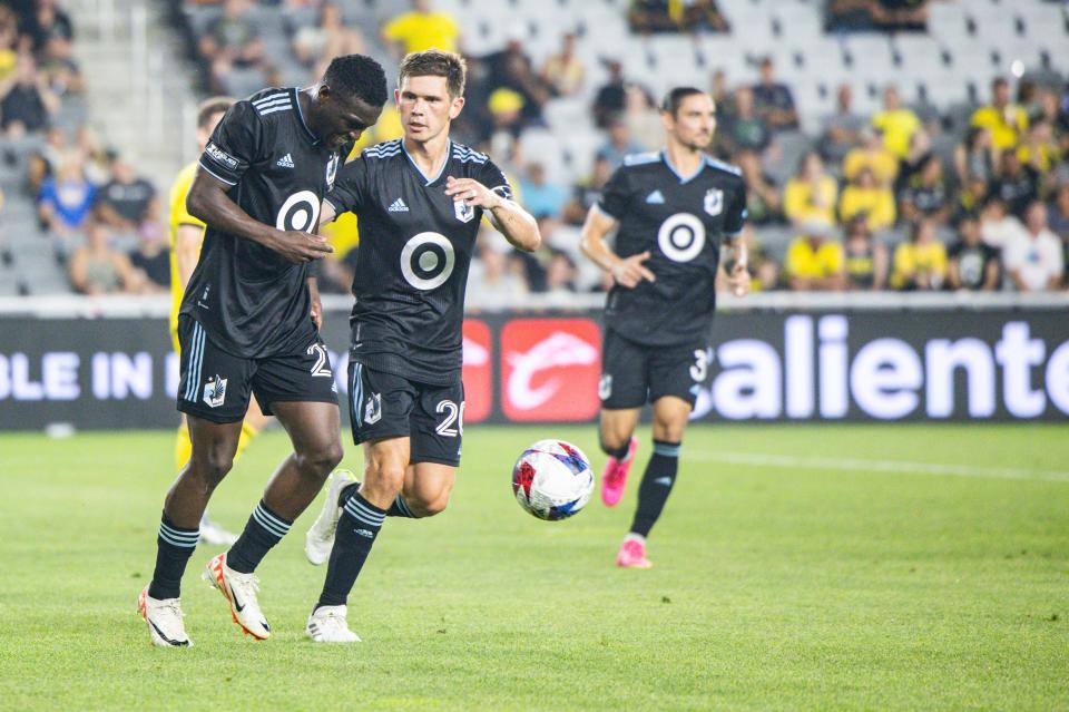 Aug 4, 2023; Columbus, OH, USA; Minnesota United forward Bongokuhle Hlongwane (21) celebrates his second goal of the game with teammates in the second half against the Columbus Crew at Lower.com Field. Mandatory Credit: Trevor Ruszkowski-USA TODAY Sports