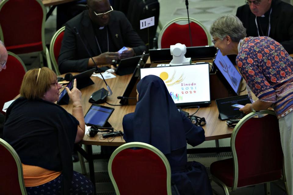 Delegates attend the synod’s first meeting, which includes religious sisters, on Oct. 5, 2023. <a href="https://www.gettyimages.com/detail/news-photo/delegates-attend-the-first-meeting-of-the-xvi-ordinary-news-photo/1718794559?adppopup=true" rel="nofollow noopener" target="_blank" data-ylk="slk:Franco Origlia/Getty Images;elm:context_link;itc:0;sec:content-canvas" class="link ">Franco Origlia/Getty Images</a>