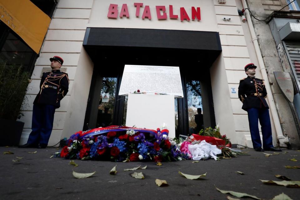 Flowers were placed outside the Bataclan as a memorial was held (EPA)