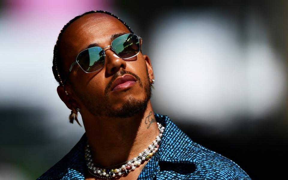 MIAMI, FLORIDA - MAY 06: Lewis Hamilton of Great Britain and Mercedes walks in the Paddock prior to practice ahead of the F1 Grand Prix of Miami at the Miami International Autodrome on May 06, 2022 in Miami, Florida. (Photo by) - Mario Renzi - Formula 1/Formula 1 via Getty Images