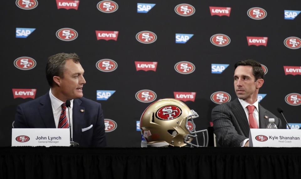 San Francisco 49ers head coach Kyle Shanahan, right, and general manager John Lynch field questions during an NFL football press conference Thursday, Feb. 9, 2017, in Santa Clara, Calif. (AP Photo/Marcio Jose Sanchez)