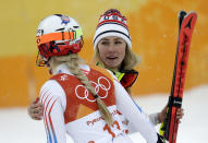 FILE - Mikaela Shiffrin, of the United States, right, hugs compatriot Lindsey Vonn after the women's combined slalom at the 2018 Winter Olympics in Jeongseon, South Korea, Thursday, Feb. 22, 2018. Mikaela Shiffrin has matched Lindsey Vonn’s women’s World Cup skiing record with her 82nd win at the women's World Cup giant slalom race, in Kranjska Gora, Slovenia, on Sunday, Jan. 8, 2023. (AP Photo/Michael Probst, File)