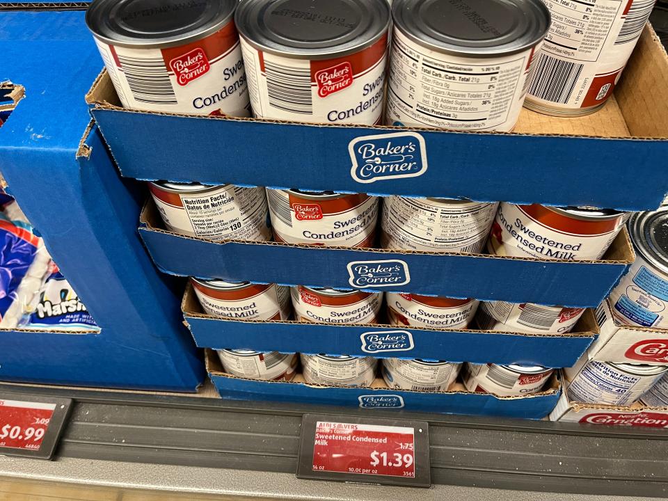 cans of sweetened condensed milk at aldi