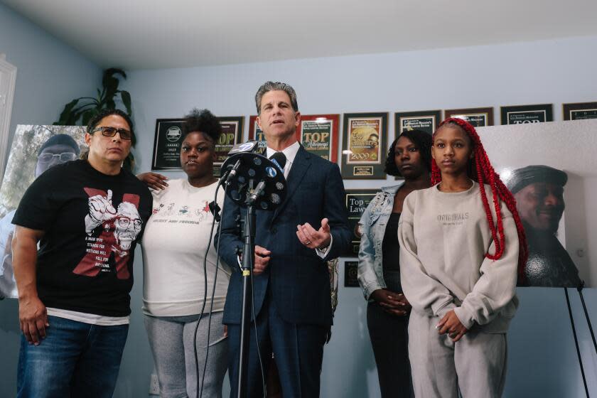 Woodland Hills, CA - June 19: Lawyer Brad Gage is joined by family members of Eugene Youngblood, who allegedly died in custody at the Lancaster jail, during a news conference to announce the filling of a damages claim at Brad Gage on Wednesday, June 19, 2024 in Woodland Hills, CA. According to a spokesperson, Youngblood entered detention as a healthy man in no apparent distress, but died four hours later without any explanation. Defendants have failed to produce jail videos and other documents. (Dania Maxwell / Los Angeles Times)