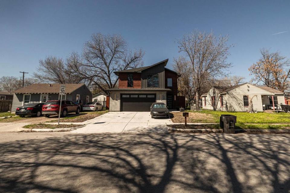 A new house built within the last year sits between two houses that have been in the Greenway neighborhood since the 1940s. Greenway is getting increased attention from home builders looking to purchase land close to downtown.