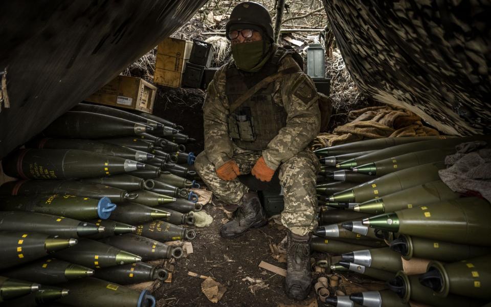 A Ukrainian serviceman surrounded by shells at their artillery position in Zaporizhzhia - Muhammed Enes Yildirim/Anadolu Agency