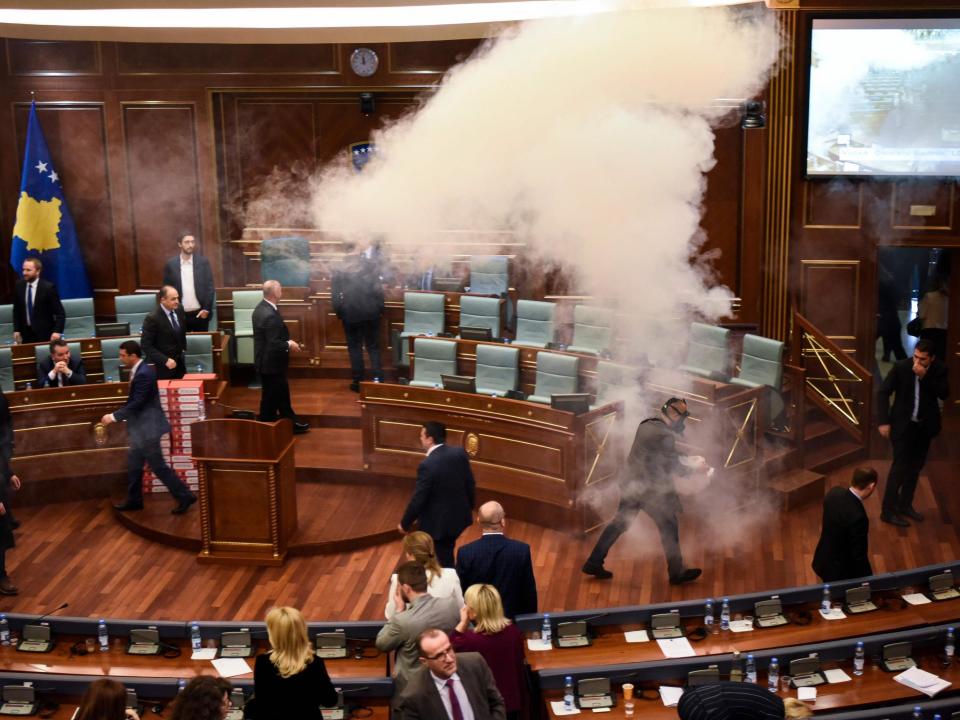 Tear gas released in Kosovo parliament by opposition party in bid to stop vote