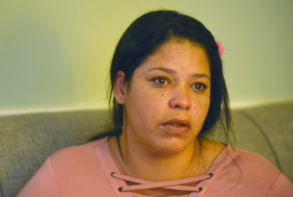 Katiuska, 31, tears up as she talks on Oct. 1, 2023, about coming to this country and leaving her seven children behind. Katiuska is one of four Venezuelan migrants who were transported to Martha's Vineyard last year by Florida Gov. Ron DeSantis are now living with Janet Abbott in Barnstable.