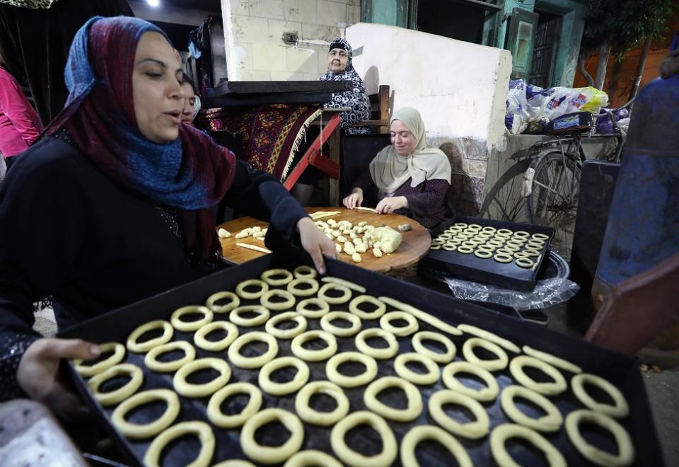 Egyptian women prepare Egyptian butter biscuits, in Tanta, some 100km north of Cairo.